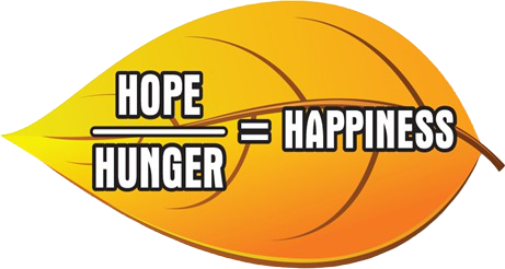 A basketball with the words hope hunger happiness on it.