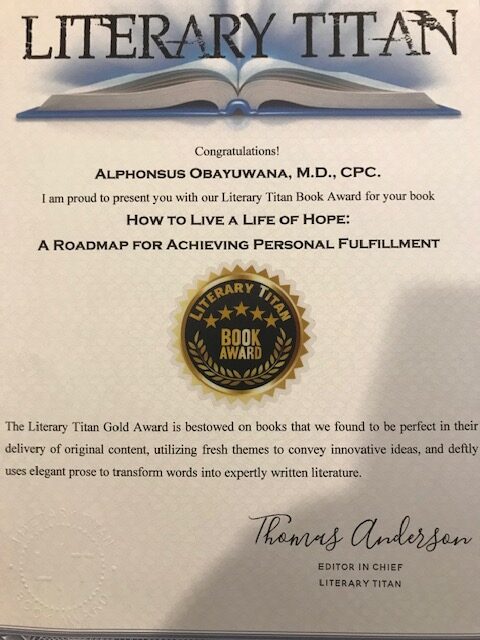A certificate of appreciation for the library that is dedicated to dr. Alphinus obatunana